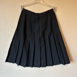 Vintage black pleated skirt from Willow Ridge.